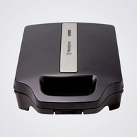 Black sandwich maker with Westinghouse logo on a Light background