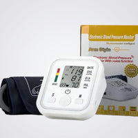 Electronic blood pressure monitor with digital display and packaging on a white background