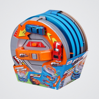 Toy car track set with packaging on a light gray background
