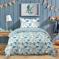 Children's bedroom with dragon-themed bedding.