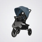 Blue, black and Grey Evenflo stroller on a light grey background