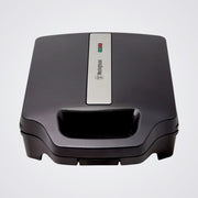 Black sandwich maker with Westinghouse logo on a Light background