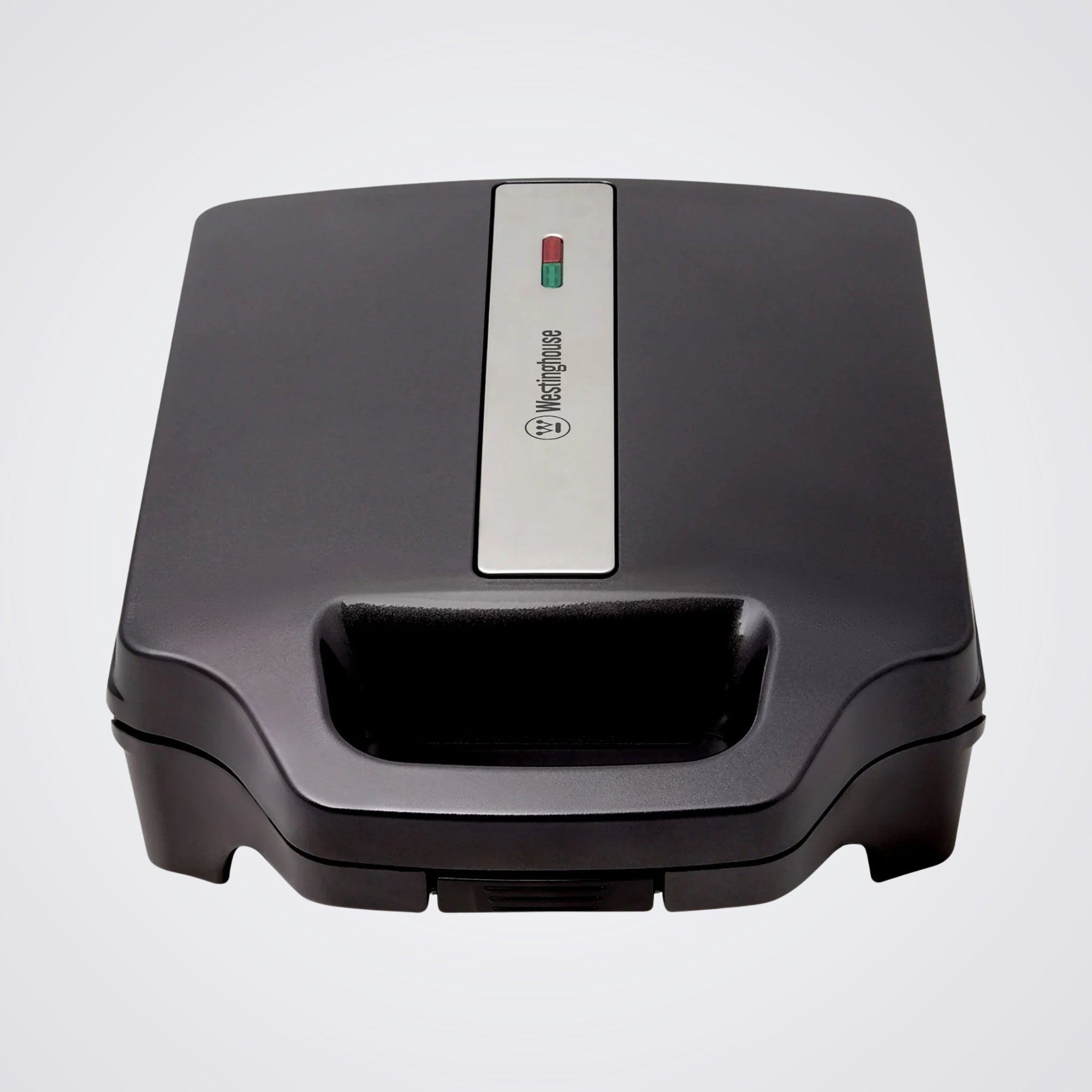 Black sandwich maker with Westinghouse logo on a Light background
