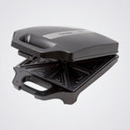 Black Westinghouse sandwich maker on a Light backgrounding
