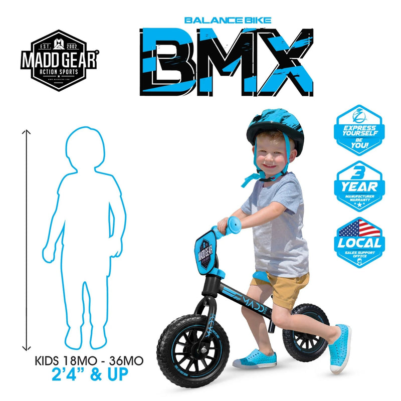 Toddler riding the blue and black Madd Gear My 1st BMX balance bike, for ages 18–36 months