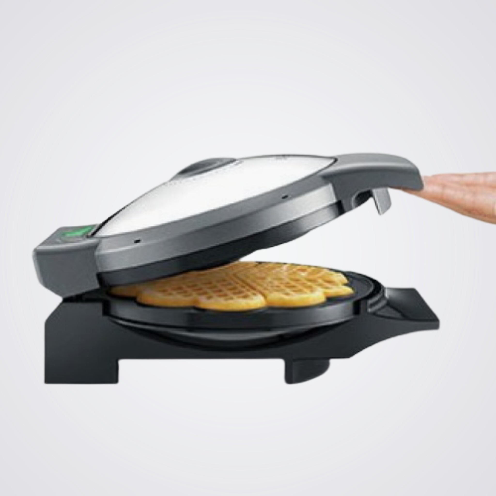 Breville Waffle maker with waffles on a
background