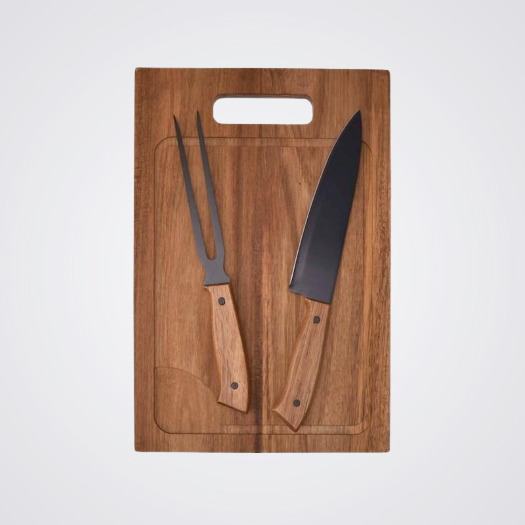 Wooden cutting board with knife and fork on a light background