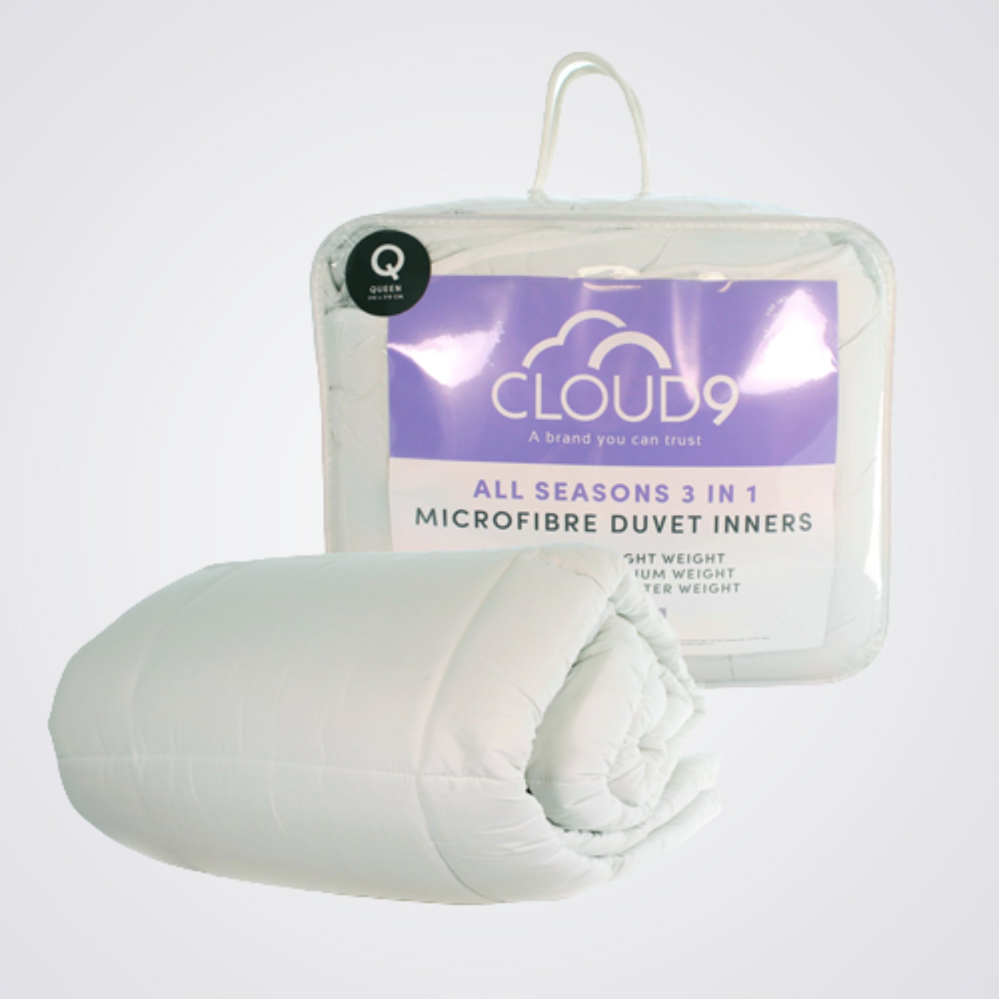White microfibre duvet inner with Cloud9 packaging on a light grey background