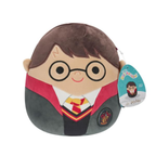 Plush toy of a character in a Harry Potter outfit with a visible tag on a white background