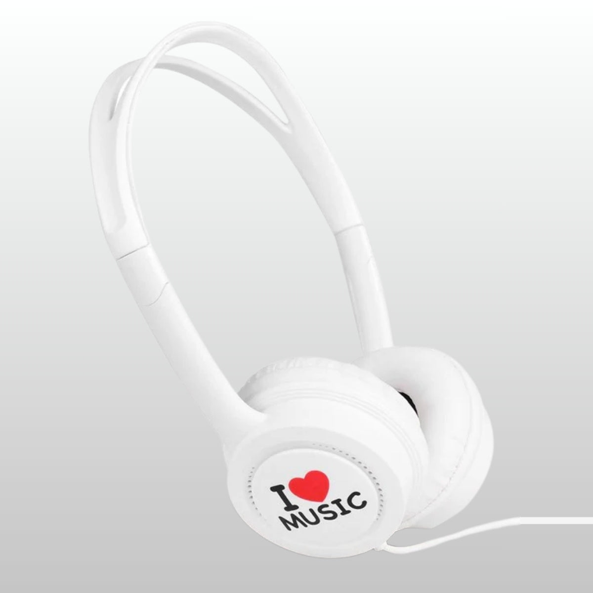 White headphones with 'I ❤️ Music' label on a light gray background