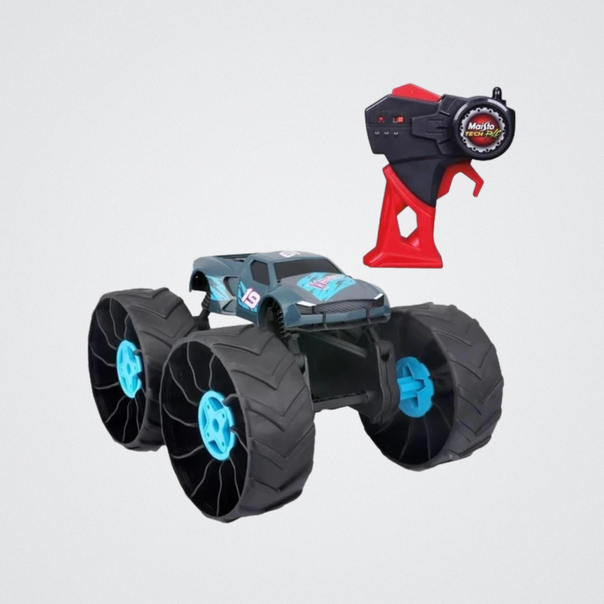 Toy monster truck with large wheels and a remote control on a light gray background