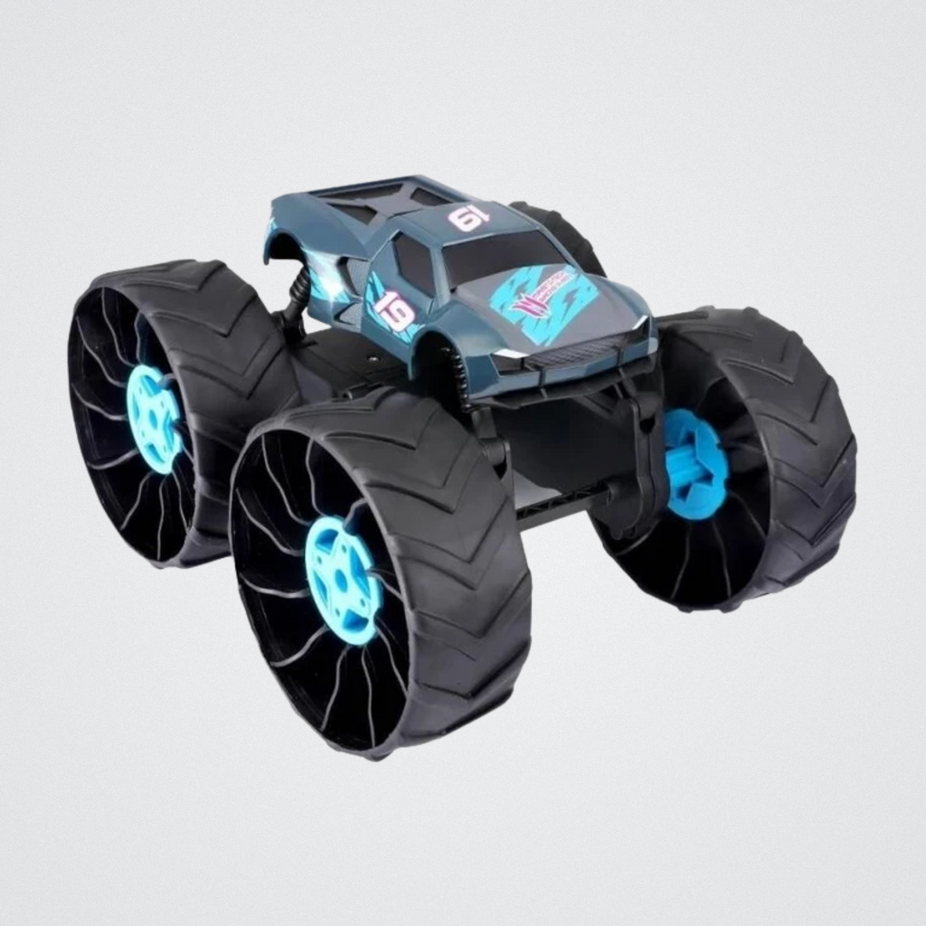 Toy monster truck with large wheels on a light gray background