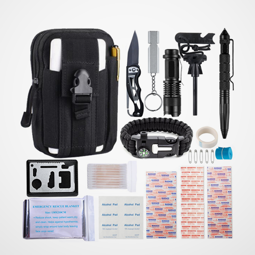 Collection of survival tools and first aid items on a light background