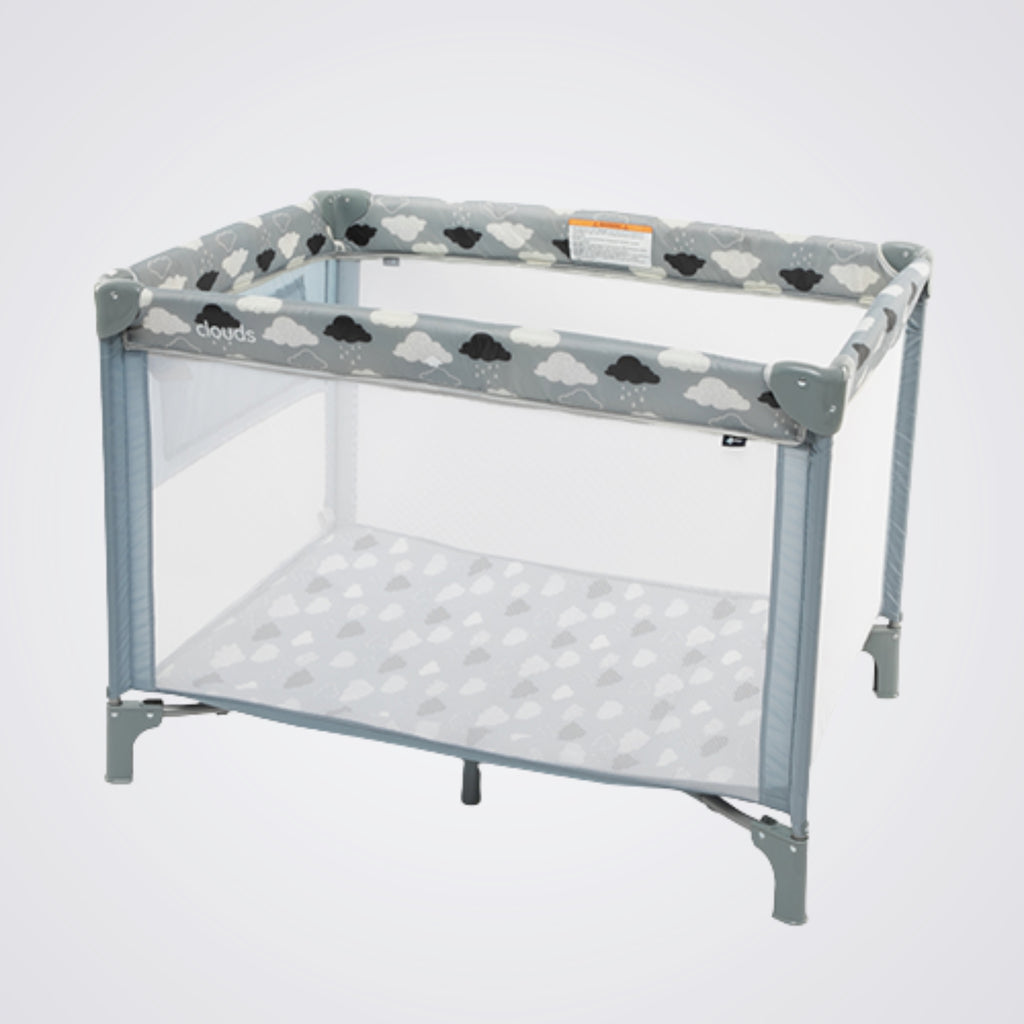 Baby playpen with cloud pattern on a light grey background