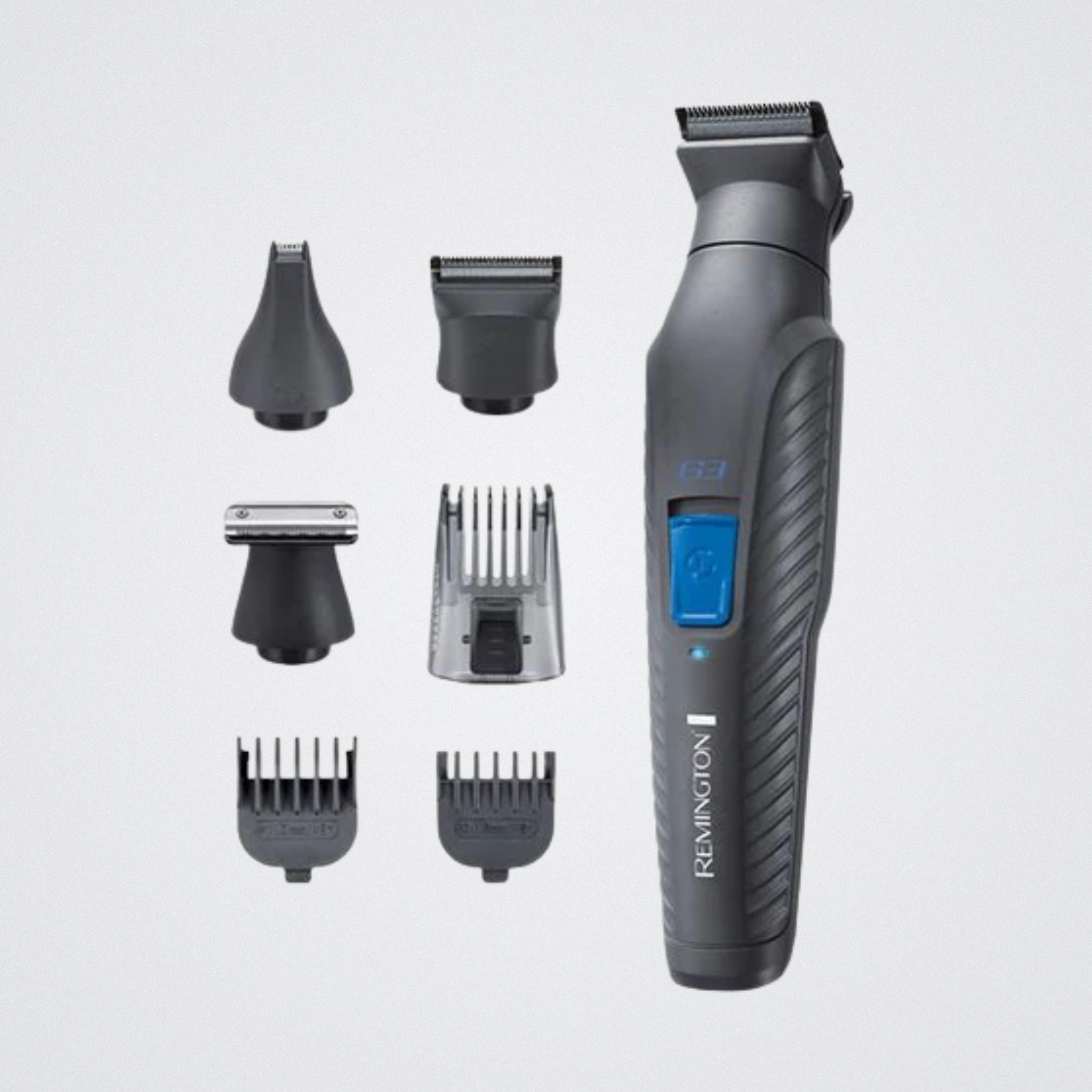 Revolusion grooming tool with attachments on a light gray background
