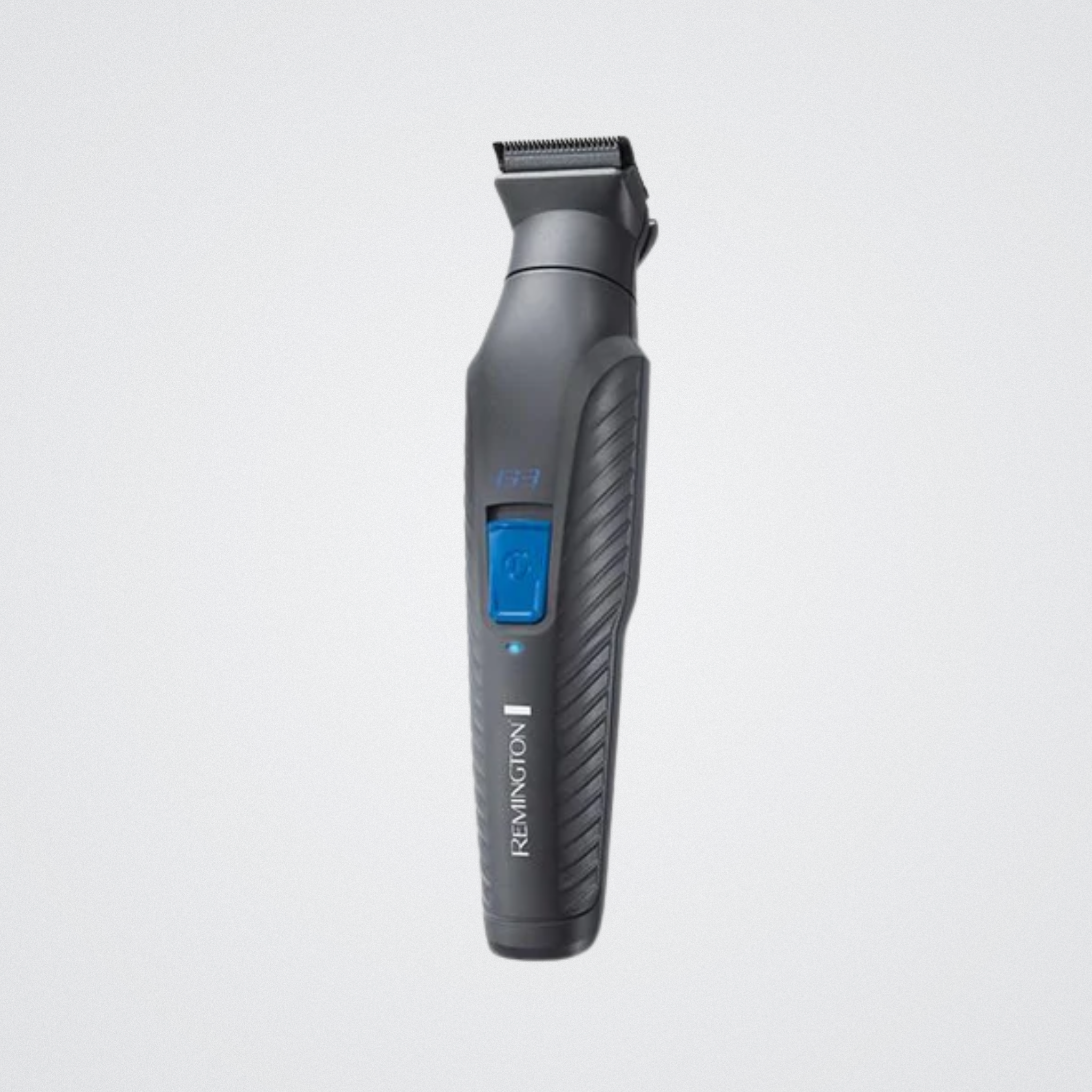 Gray Remington grooming tool on a light gray background