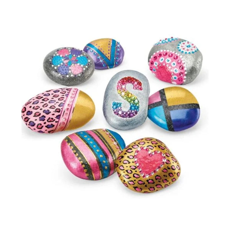 Colorful decorated stones on a white background