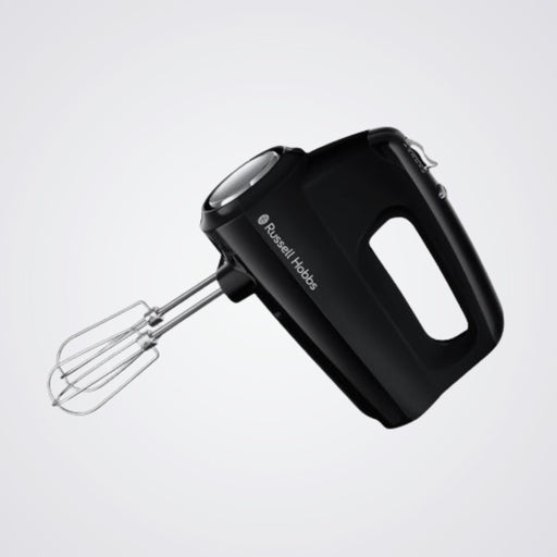 Black hand mixer with whisk attachment on a light grey background