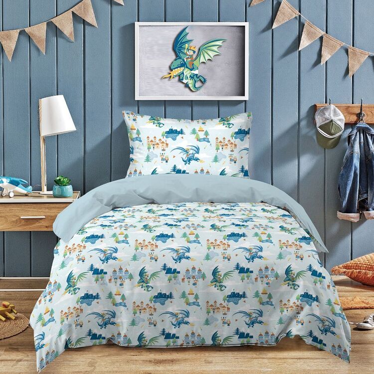 Children's bedroom with dragon-themed bedding.