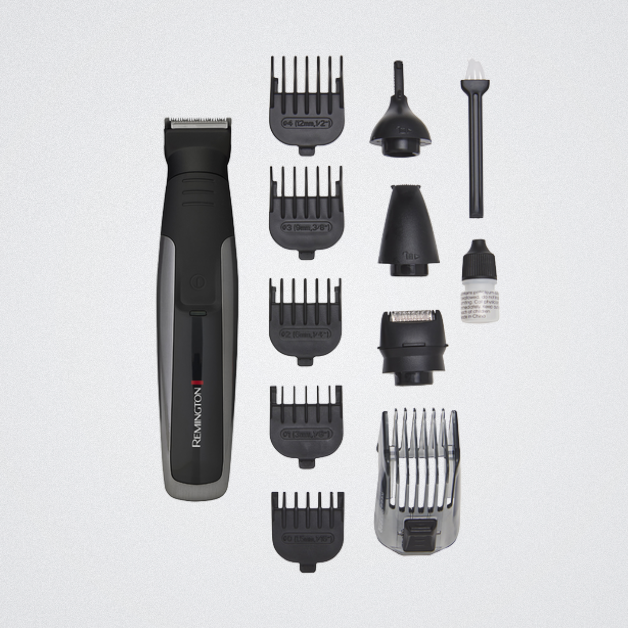 Remington hair trimmer set with various attachments on a light gray background
