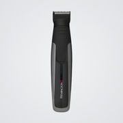 Black and gray Remington hair trimmer on a light gray background
