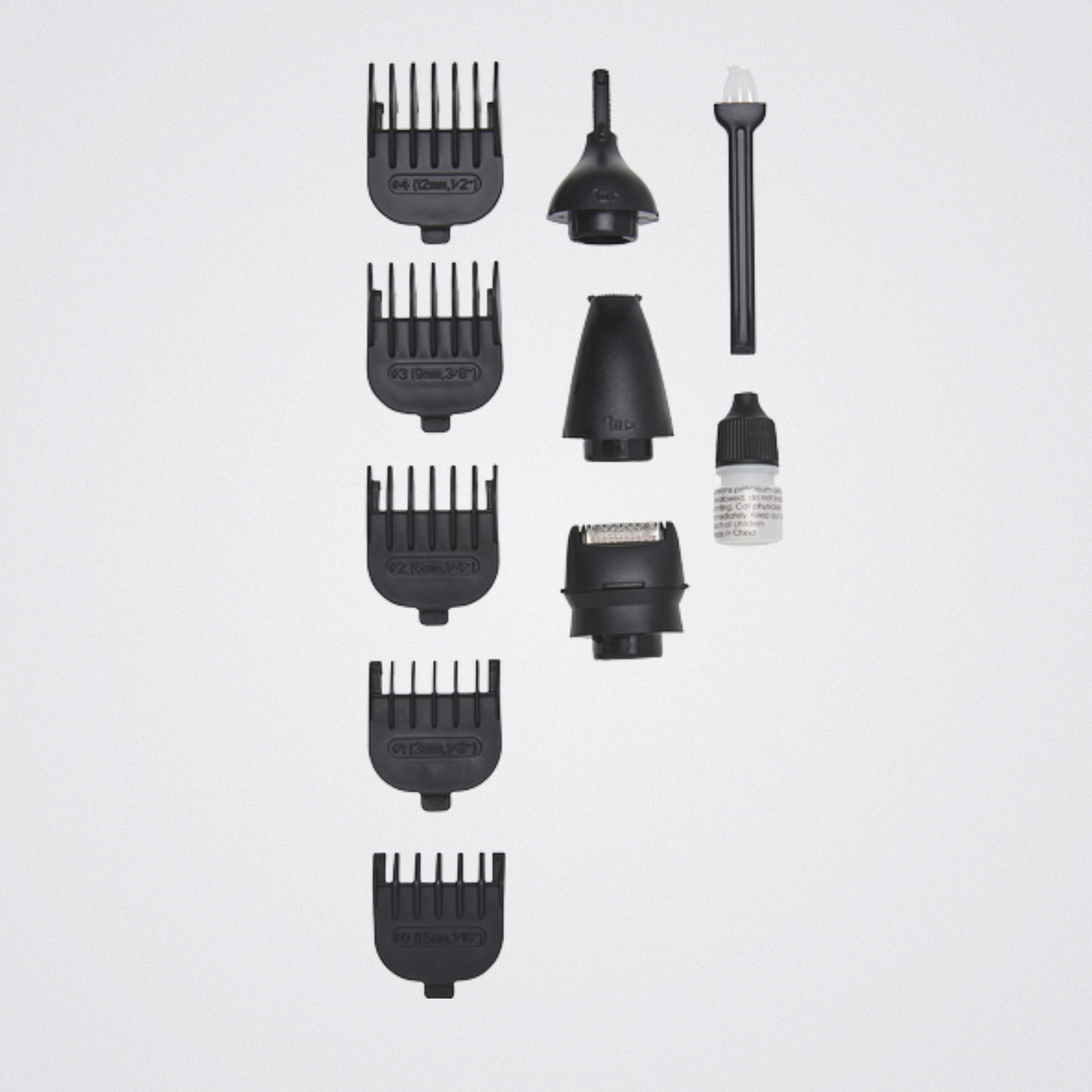 Set of black hair styling tools on a light gray background