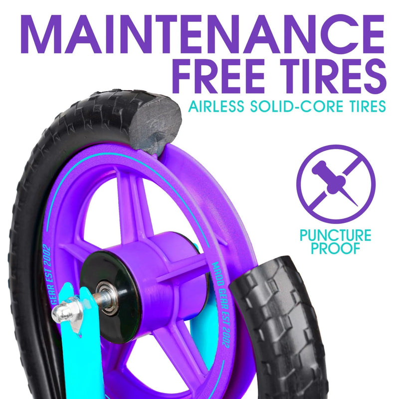 Puncture-proof solid tyres on the Madd Gear teal and purple balance bike