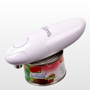 Touch and Go electric can opener opening a can