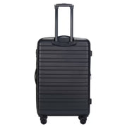 Black suitcase with a ribbed texture on a white background
